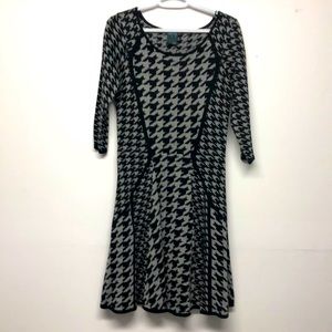 This is a beautiful black and gray winter dress by Gabby SKYE.knitted-Size small